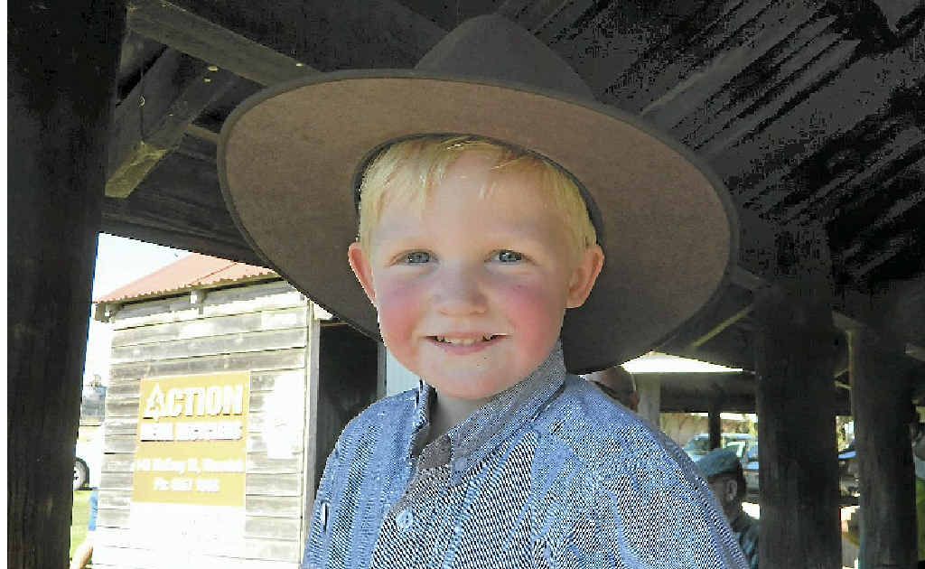 Three-year-old Kricket Wooster loves buying animals at the sale for his farm. Three-year-old Kricket Wooster loves buying animals at the sale for his farm.